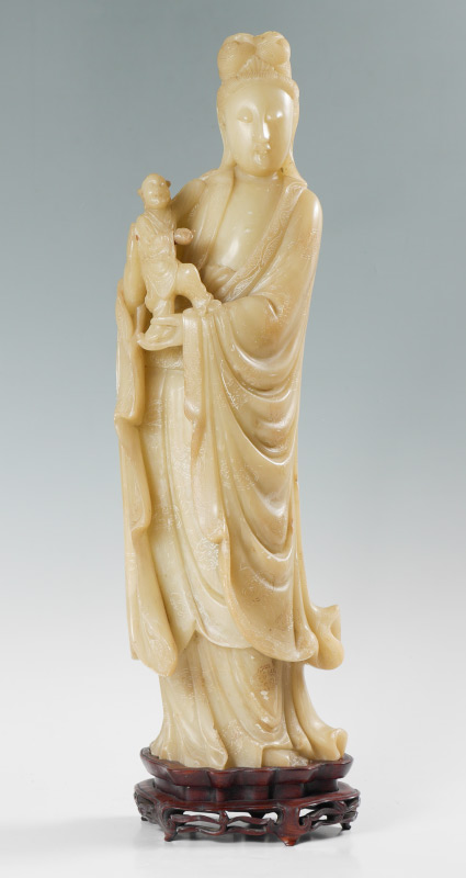 Appraisal: CHINESE STONE FIGURE OF QUAN YIN Carved soft stone figure