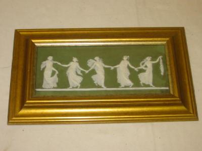 Appraisal: A WEDGWOOD JASPER WARE PLAQUE of oblong form moulded in