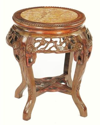 Appraisal: A Chinese carved hardwood and marble inset low jardiniere stand