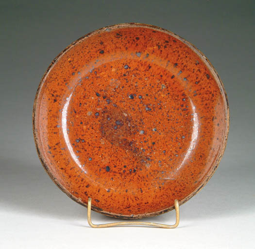 Appraisal: GLAZED REDWARE BOWL Orange ground with black speckle decoration Pennsylvania