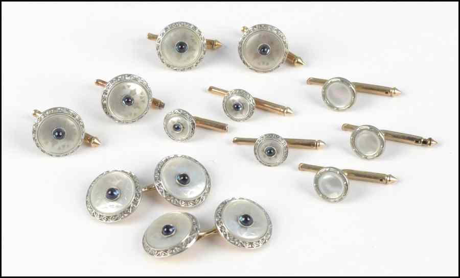 Appraisal: ASSEMBLED ART DECO MOTHER-OF-PEARL AND SAPPHIRE DRESS SET Comprised of