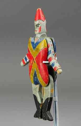 Appraisal: GERMAN CARVED JUMPING JACK Wood jointed body polychromed in red