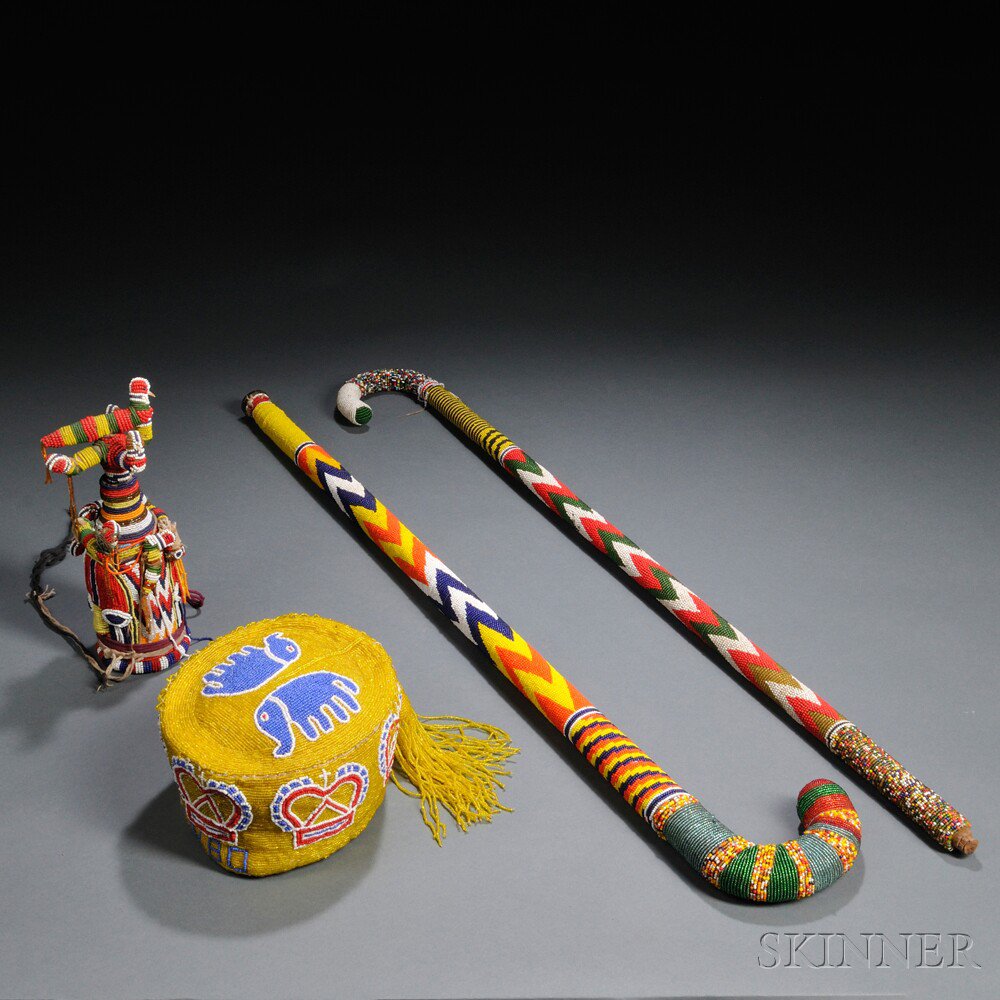 Appraisal: Four Yoruba Beaded Items two canes a beaded bottle in