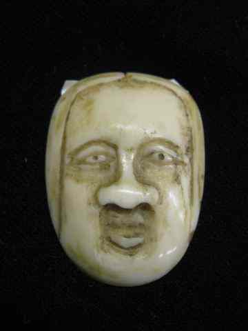 Appraisal: Carved Ivory Netsuke of a Mask signed '' x ''