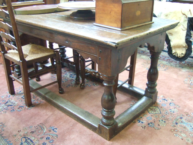 Appraisal: A mid th century adapted oak refectory table the cleated