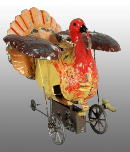 Appraisal: Tin Hand-Painted Turkey Wind-Up Toy Description German Working Includes third