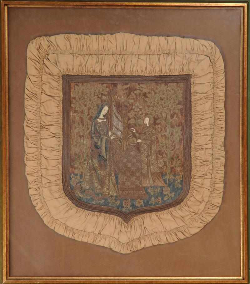 Appraisal: MEDIEVAL STYLE EMBROIDERED PANEL Of shield-form worked in wool and