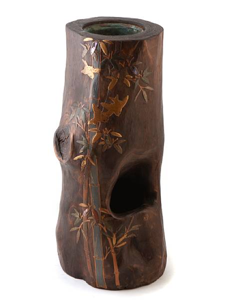 Appraisal: A Japanese tree trunk flower arranging vase with gilt lacquer