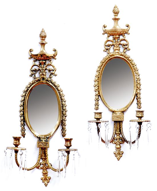 Appraisal: Pair Adam style brass and mirror wall sconces urn-shaped pediment