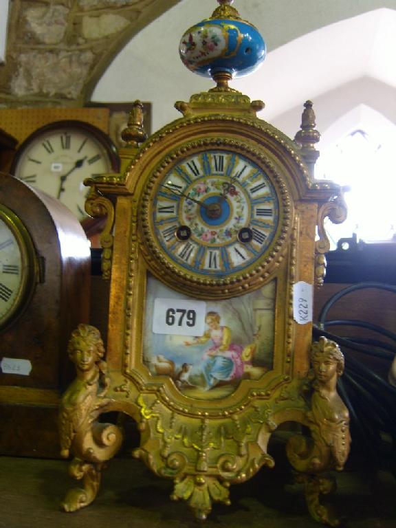 Appraisal: A Victorian gilt brass mantle clock of classical form with