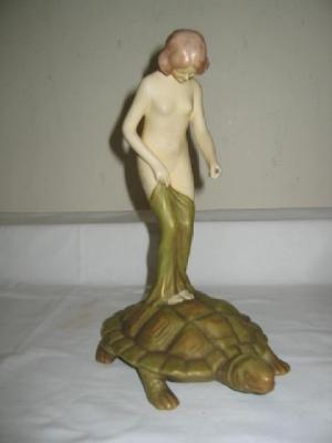 Appraisal: A ROYAL DUX PORCELAIN FIGURE modelled as a nude girl