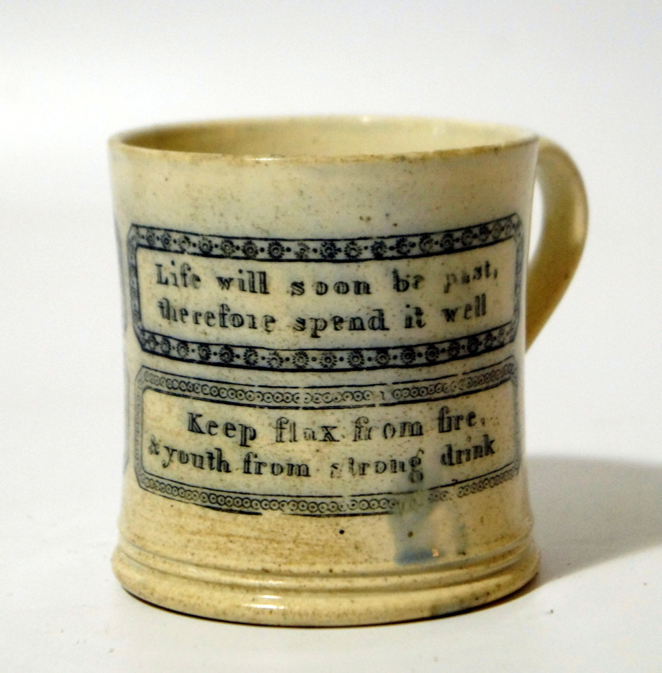 Appraisal: An early thC Staffordshire pottery motto tankard the cylindrical body