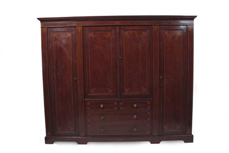 Appraisal: A mid th century mahogany and inlaid four door wardrobe