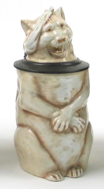 Appraisal: A GERMAN MUSTERSCHUTZ CHARACTER STEIN Cat With Hangover tan C