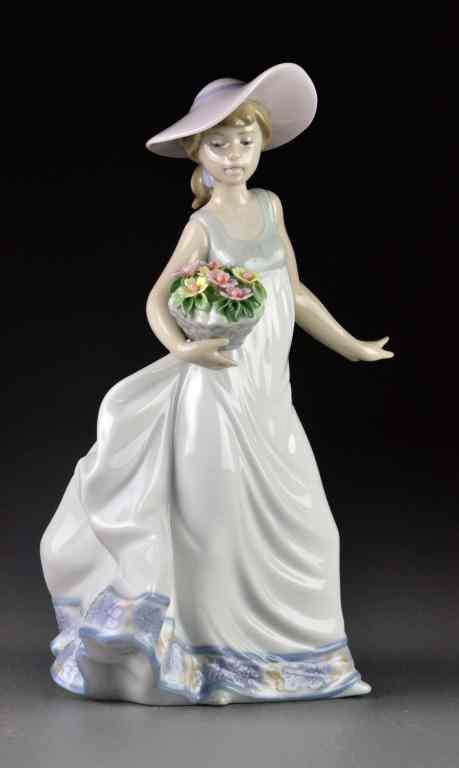 Appraisal: Lladro Porcelain Figurine ''Carefree'' - Signed''Con Flores Y Brisa'' depicting