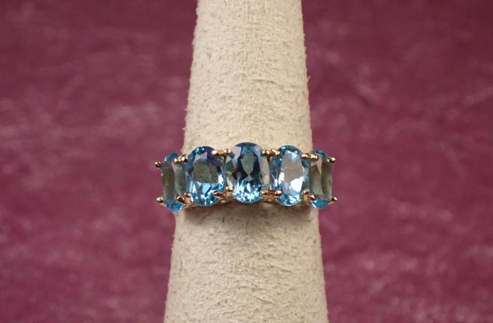 Appraisal: SAMUEL AARON SIGNED BLUE TOPAZ AND YELLOW GOLD RING The