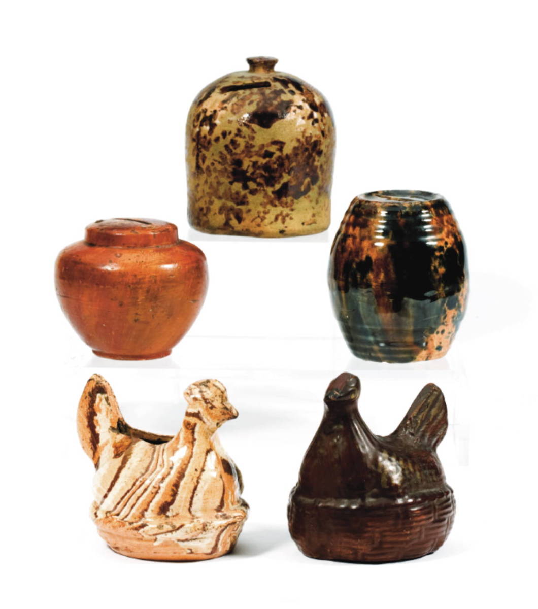 Appraisal: FIVE SOLID AGATE REDWARE AND STONEWARE BANKS NINETEENTH-EARLY TWENTIETH CENTURY