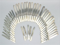 Appraisal: A Large Lot of Pearl Handled Dinner Knives A large