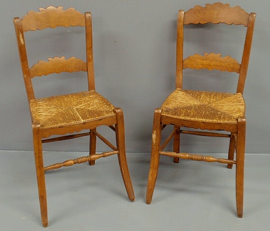 Appraisal: Pair of delicate country French fruitwood side chairs th c