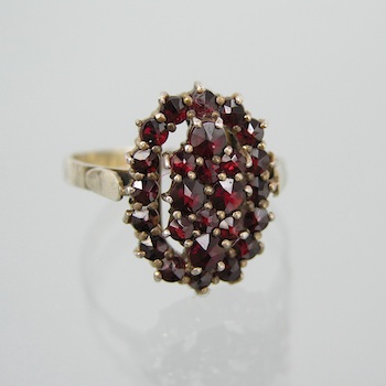 Appraisal: A Vintage Czech Garnet Ring in Silver Two-tiered mount set