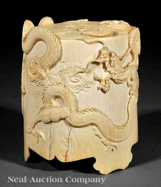 Appraisal: A Fine Japanese Carved Ivory Covered Box the cylindrical body