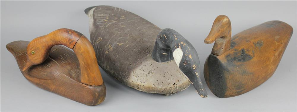 Appraisal: THREE CARVED DUCK DECOYS including one cork painted decoy of