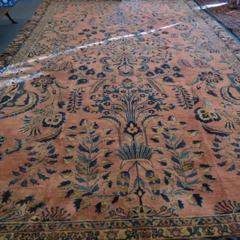 Appraisal: Sarouk Persian Handmade Room Size Rug antique elaborate floral salmon