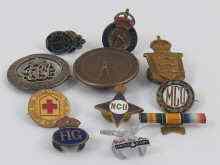 Appraisal: A quantity of badges including Red Cross Civil Defence etc