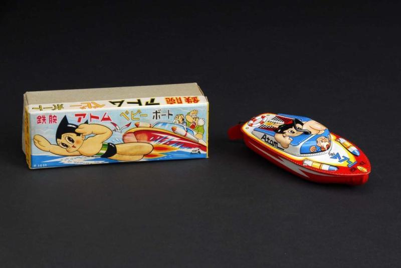 Appraisal: Mighty Atom Speedboat Toy Description Japanese Made by Tada Working