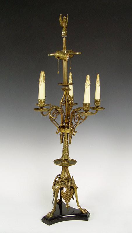 Appraisal: BRONZE TABLE TOP CANDELABRA LAMP Tri legged paw foot base