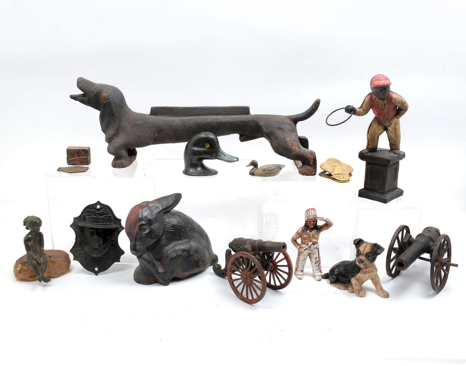 Appraisal: FIGURAL METAL COLLECTION Including - toy cannons Cast iron lawn