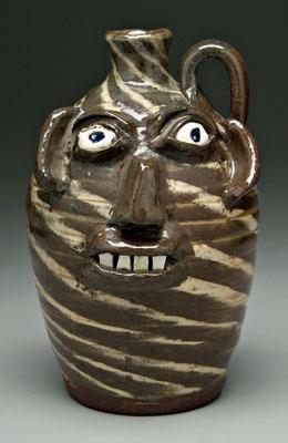 Appraisal: B B Craig stoneware face jug single handle broken china