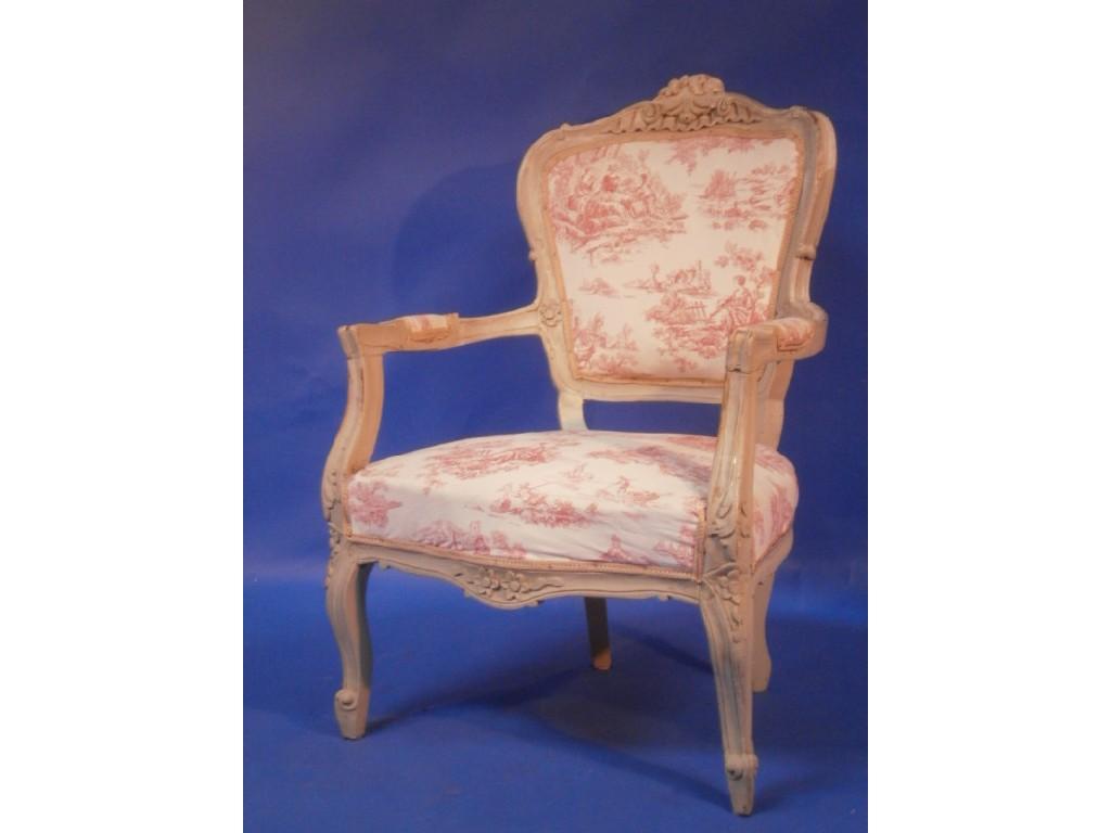 Appraisal: A French style open arm salon chair raised on cabriole