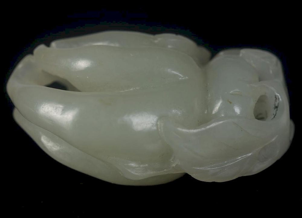 Appraisal: CARVED JADE CITRON AND BRACELET A carved jade citron form