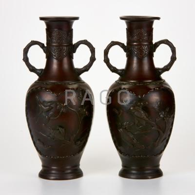 Appraisal: PAIR OF CHINESE BRONZE VASES Two-handled decorated with birds on