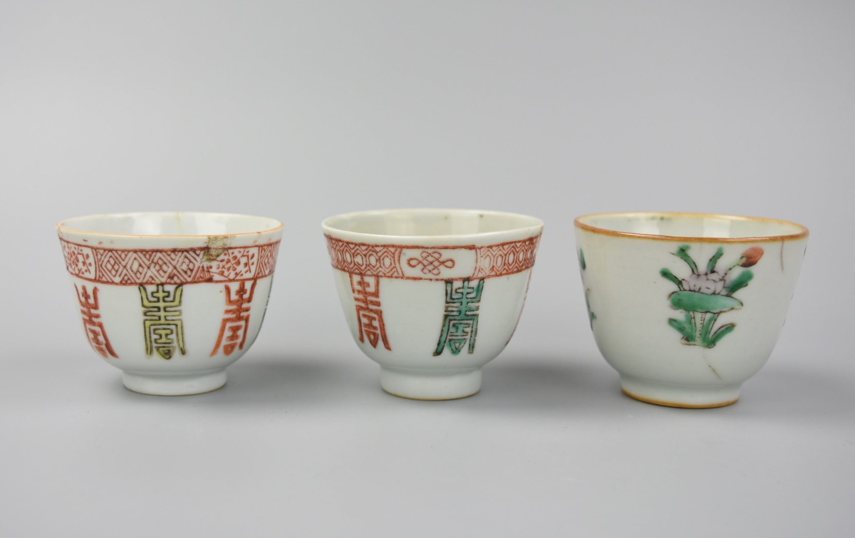 Appraisal: CHINESE CHINESE FAMILLE ROSE CUPS TH C Three Chinese th