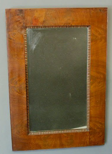 Appraisal: Empire mahogany veneered mirror with ripple carved insert h x