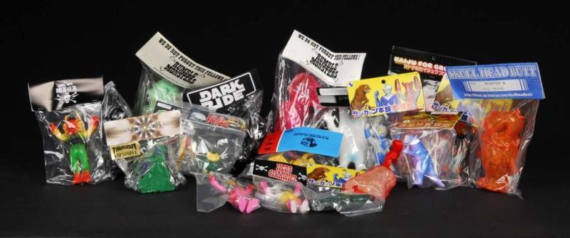 Appraisal: Lot of Vinyl Figures Description Japanese Cronic Skull Toys Dark