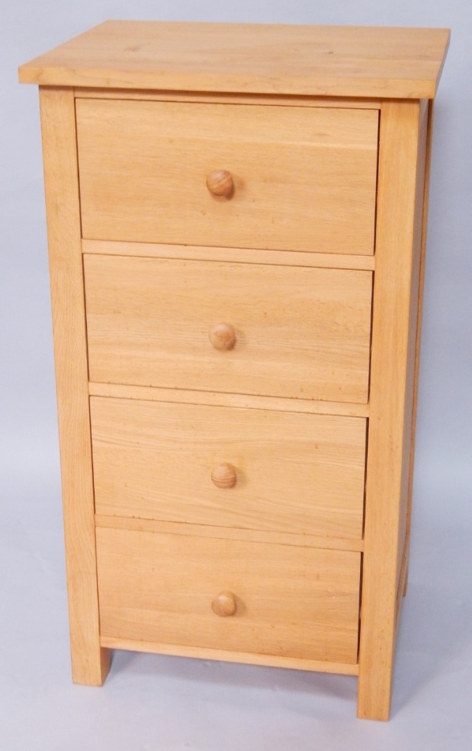 Appraisal: A light oak chest of four drawers width cm depth