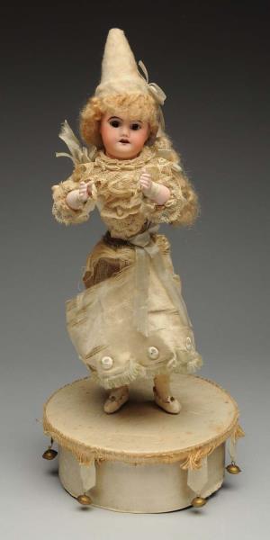 Appraisal: French Toy On Wheels Standing girl with bisque SFBJ head