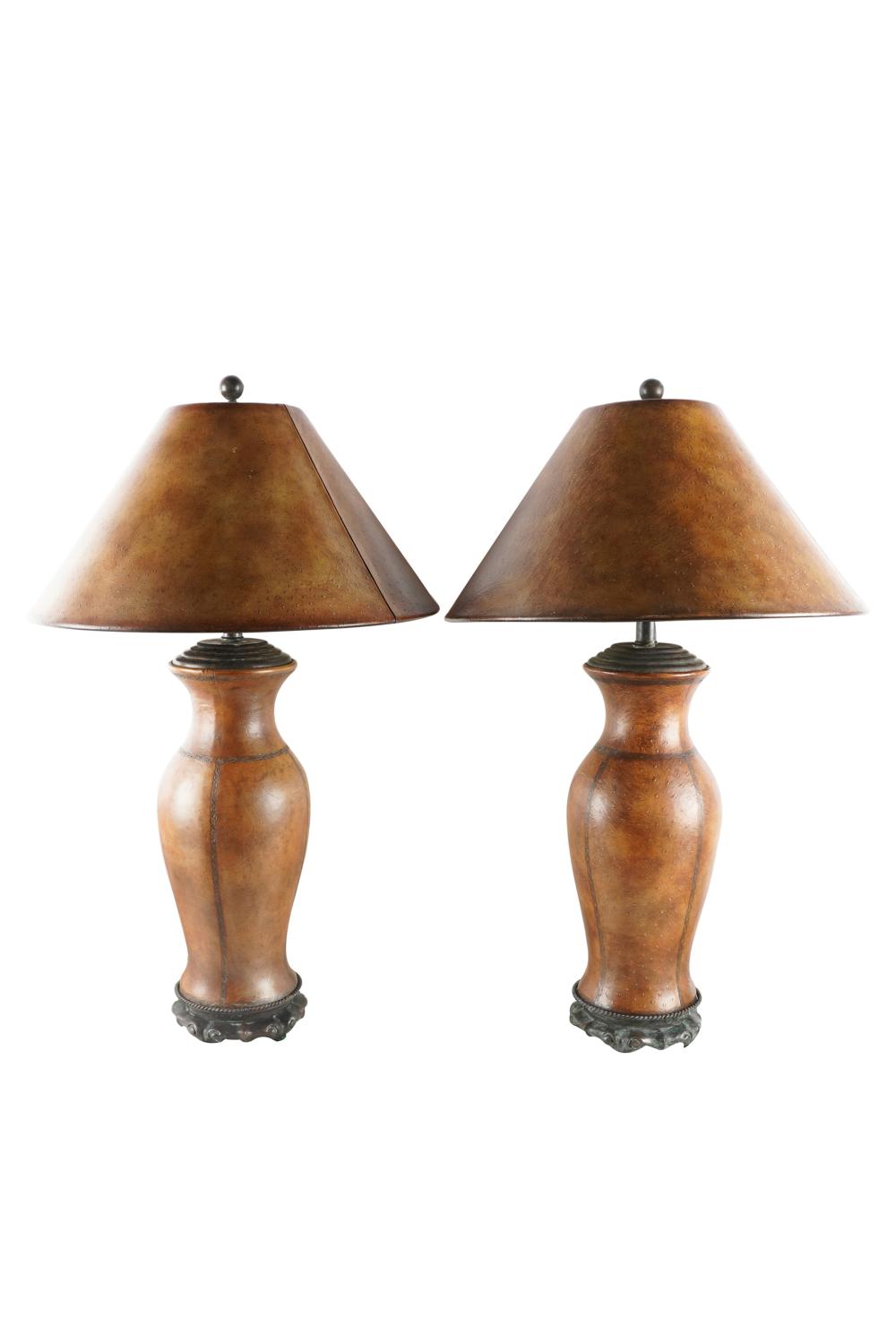 Appraisal: PAIR OF LEATHER WRAPPED TABLE LAMPSwith leather shades on metal