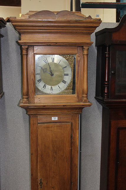 Appraisal: A PINE HOUR LONGCASE CLOCK the ten and a half