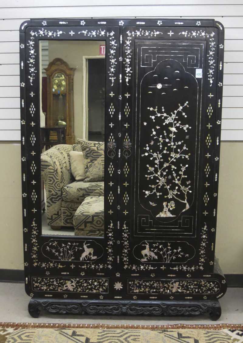 Appraisal: MOTHER-OF-PEARL INLAID WARDROBE Indonesia early th century a -door wardrobe