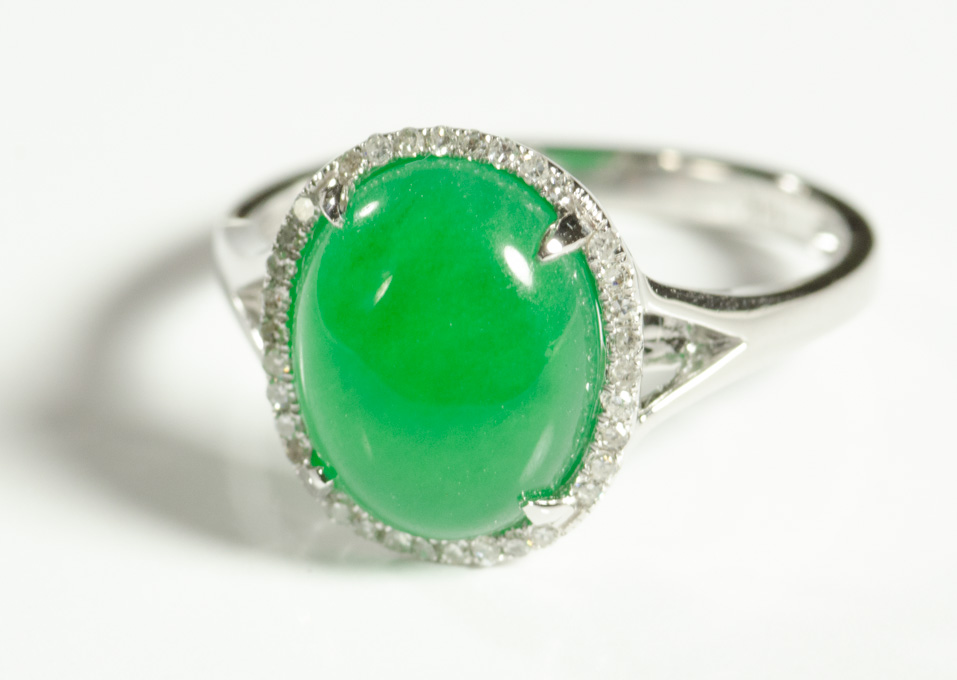 Appraisal: JADE DIAMOND AND FOURTEEN KARAT WHITE GOLD RING with round-cut