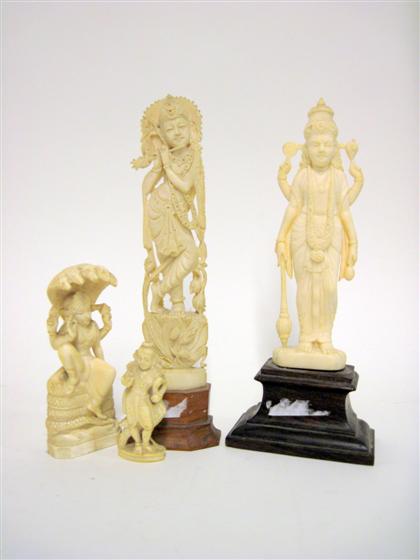 Appraisal: Four Indian elephant ivory carvingsOf figural form depicting female Hindu