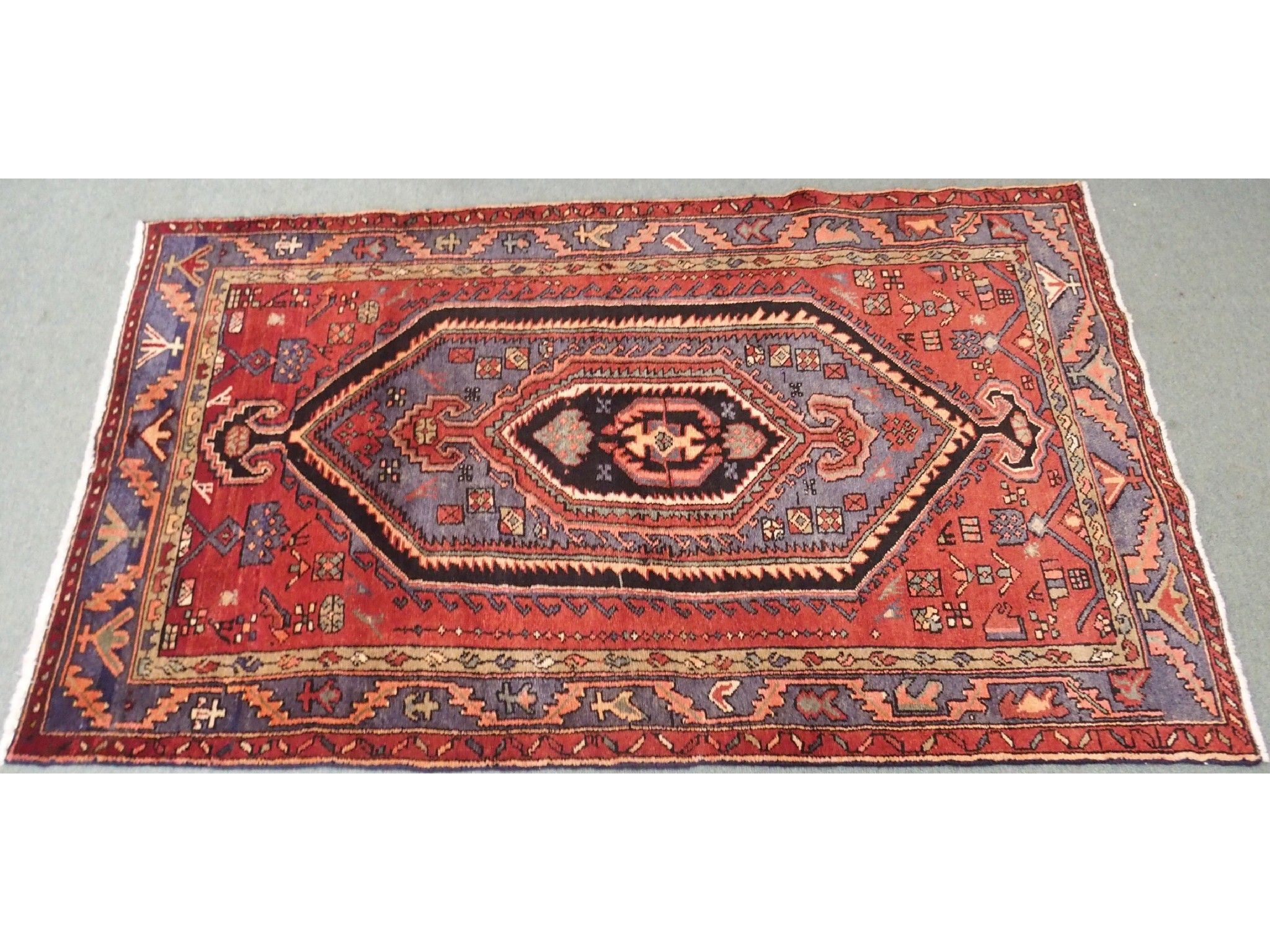 Appraisal: A red ground Persian Hamadan rug x cm