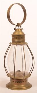 Appraisal: Unmarked Brass Railroad Lantern Circular handle bulbous colorless glass shade