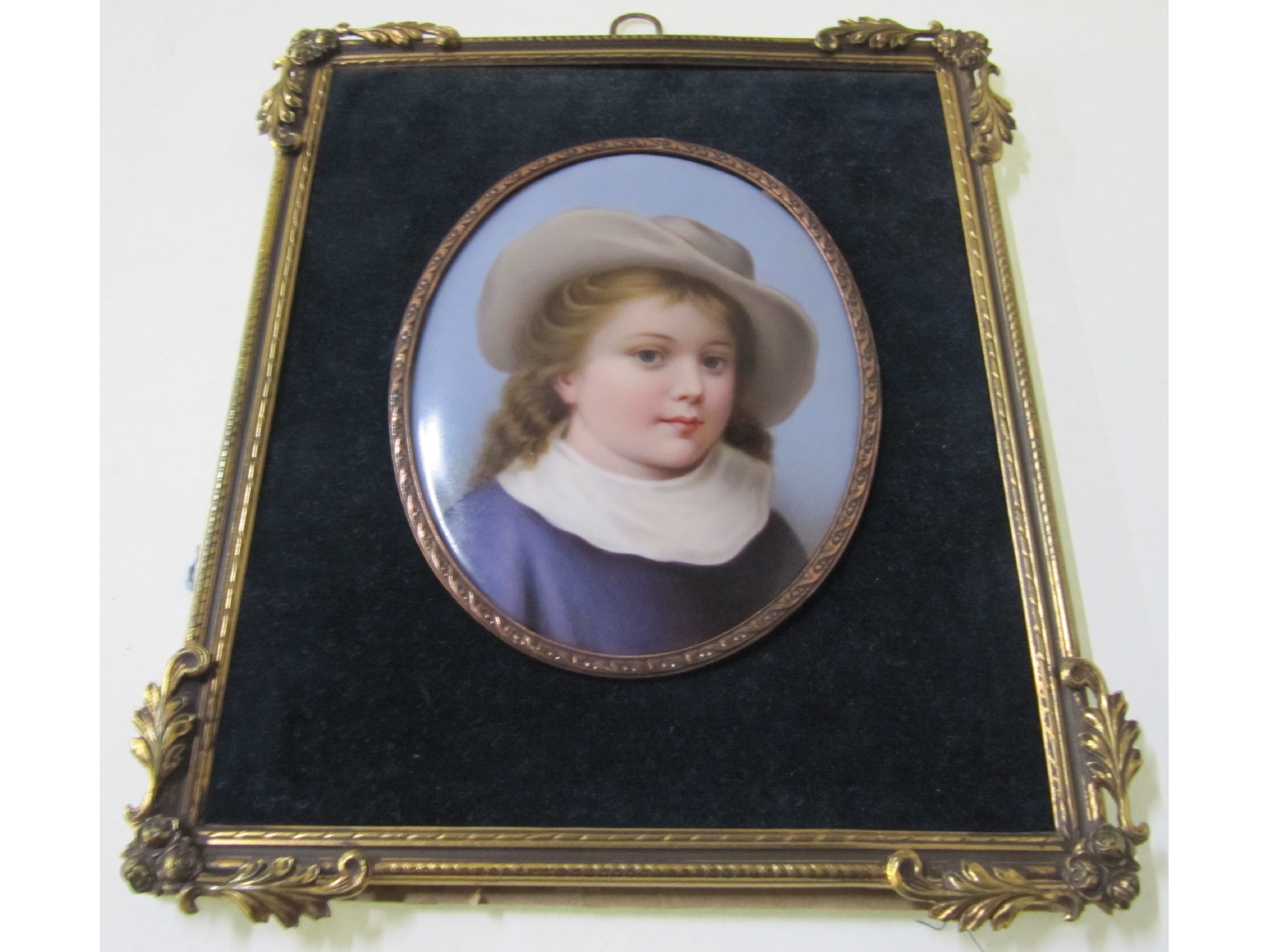 Appraisal: A framed portrait miniature of a young boy