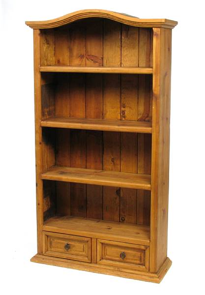 Appraisal: A Spanish Colonial style pine bookcase height ft width in