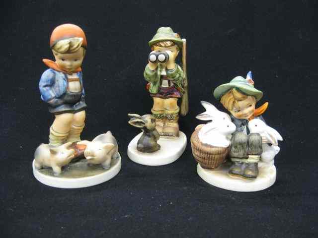 Appraisal: Hummel Figurines ''Playmates'' full bee ''Farm Boy'' Goebel mark and